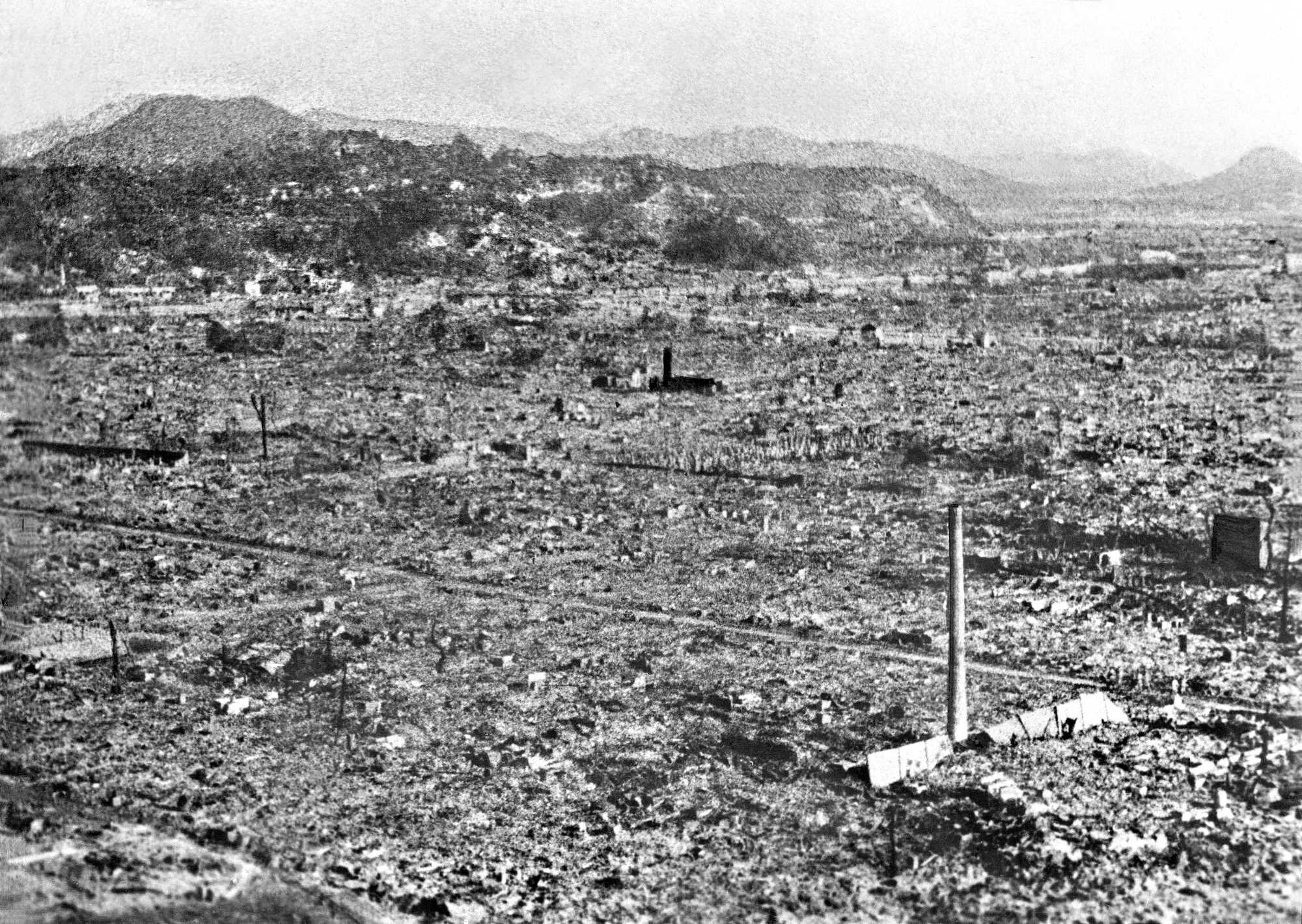 The atomic bomb blast scorched the city's urban area, leaving intact only the smokestack of a soy sauce factory. 
          The upper part of the chimney is preserved at the Hiroshima Peace Memorial Museum. 
          This photo was taken sometime between Aug. 10 and 17 in 1945 from the local newspaper Chugoku Shimbun's headquarters. (Kyodo)