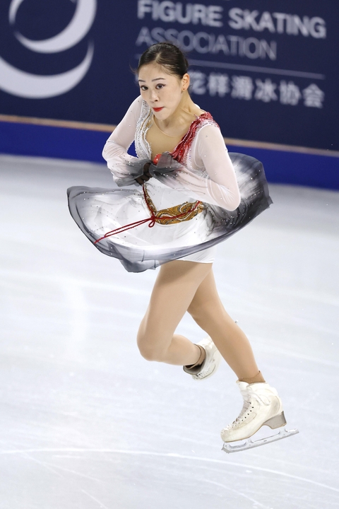 女子フリー 演技する吉田陽菜=重慶(共同)