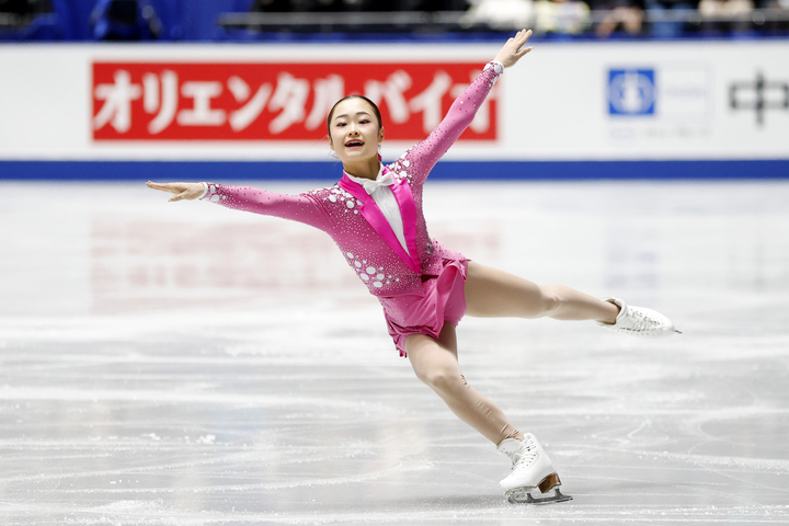 女子SP トリプルアクセルを決めた島田麻央=国立代々木競技場